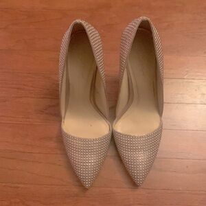 Gently used Imagine by Vince Camuto gold pumps.